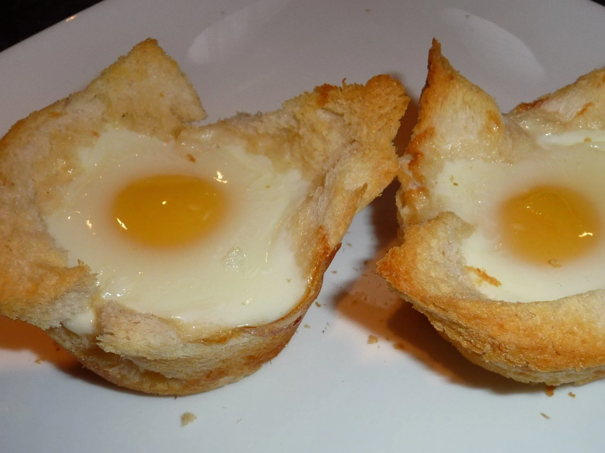 Baked Eggs in Bread Baskets