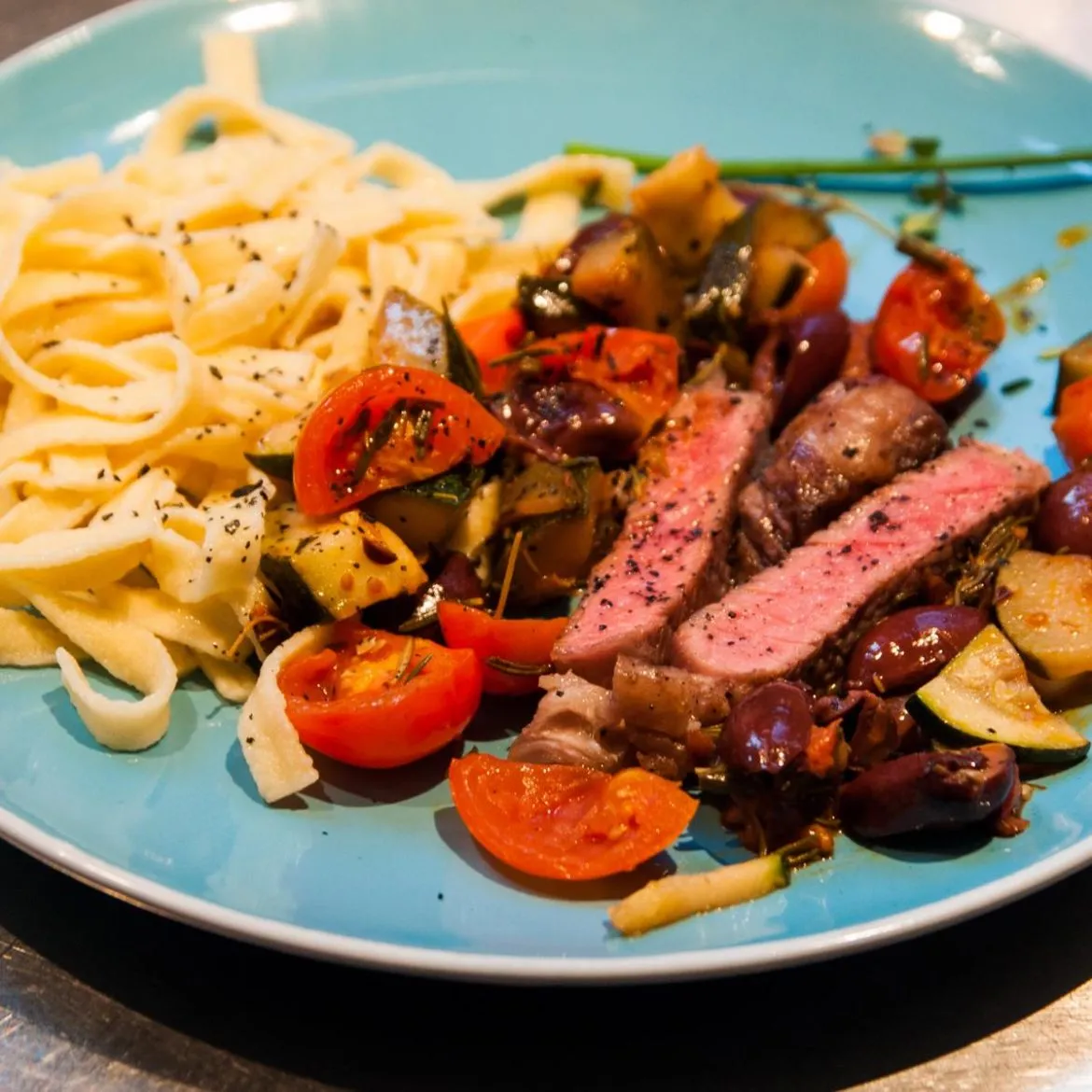 Beef Tagliata with Olives and Tomatoes
