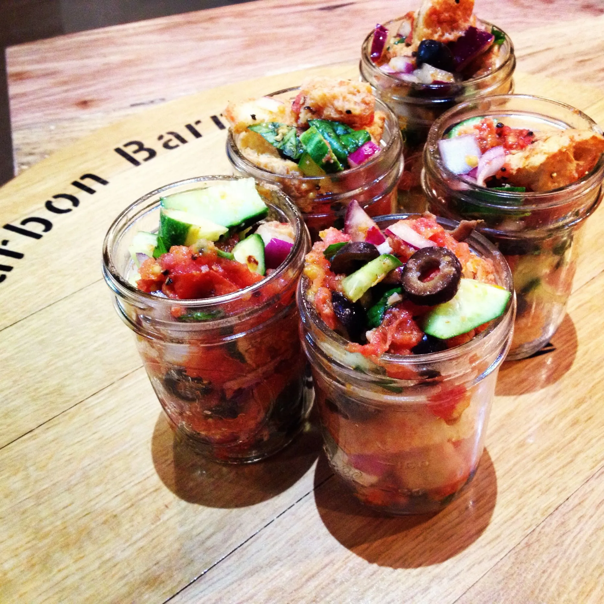 Bread Salad with Charred Tomatoes, Cucumber, and Olives