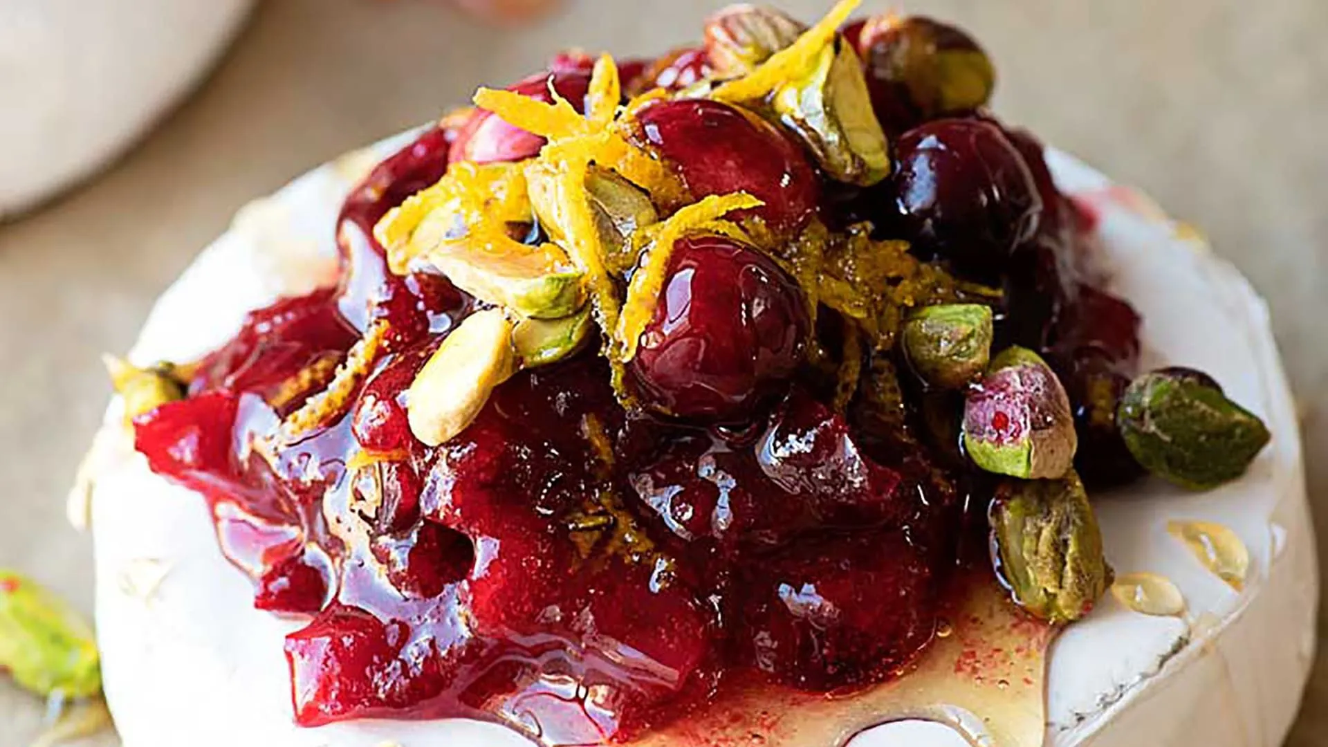 Brie with Cranberry Sauce and Pistachios