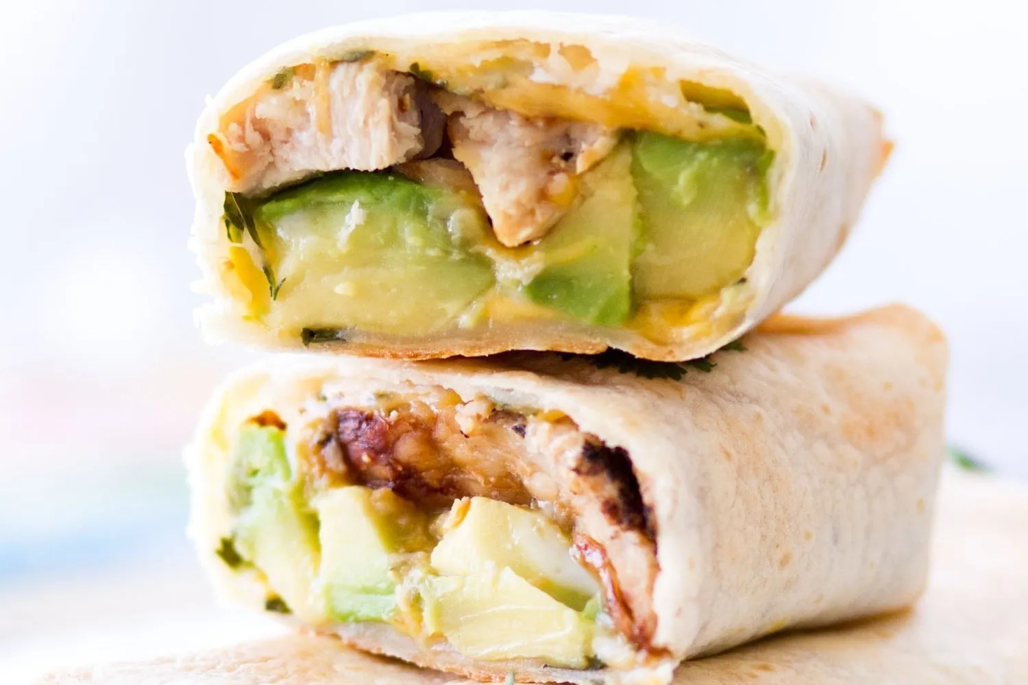 Chicken Avocado and Corn Burritos with Feta Sauce