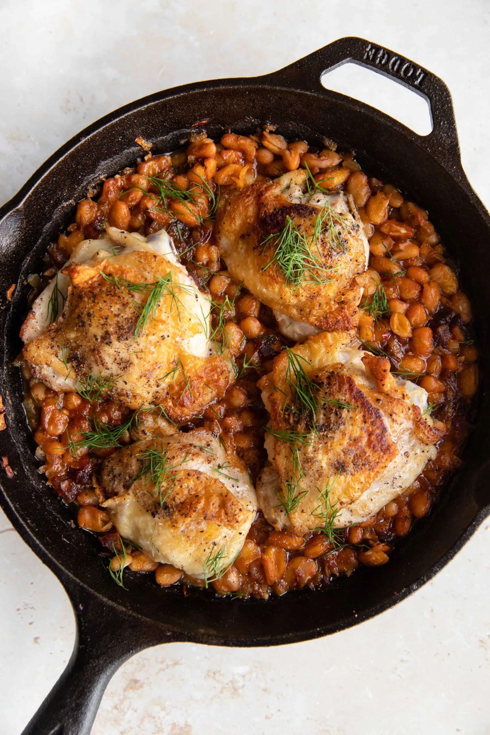Chicken Thighs with Harissa Rose Water Sauce and Lemon Couscous