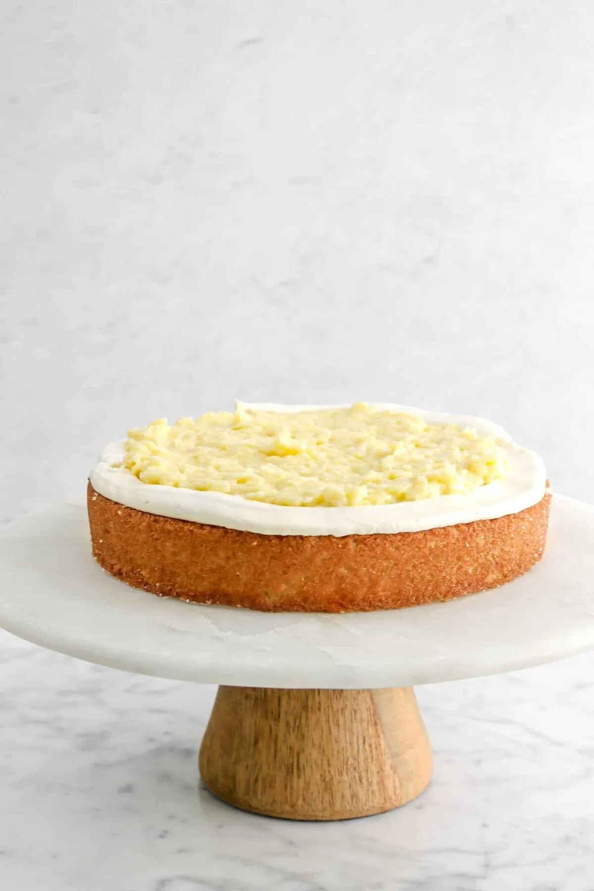 Coconut Cake with Coconut Pastry Cream Filling and Vanilla Buttercream