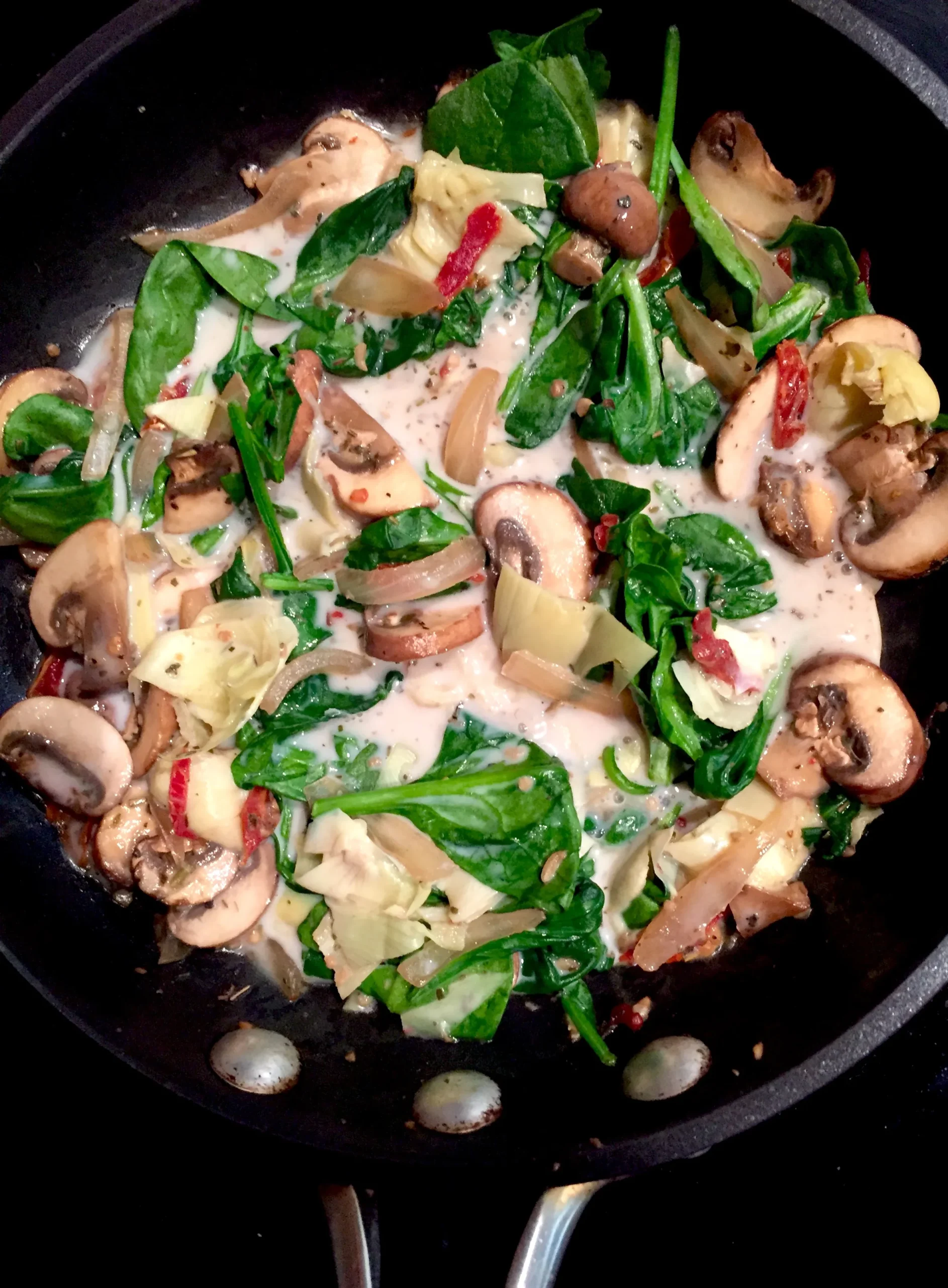 Creamy Spinach Sun Dried Tomato Artichoke Omelet