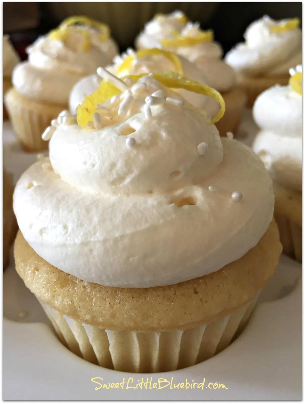Cupcakes with Lemon Curd and Lemon Whipped Cream Frosting