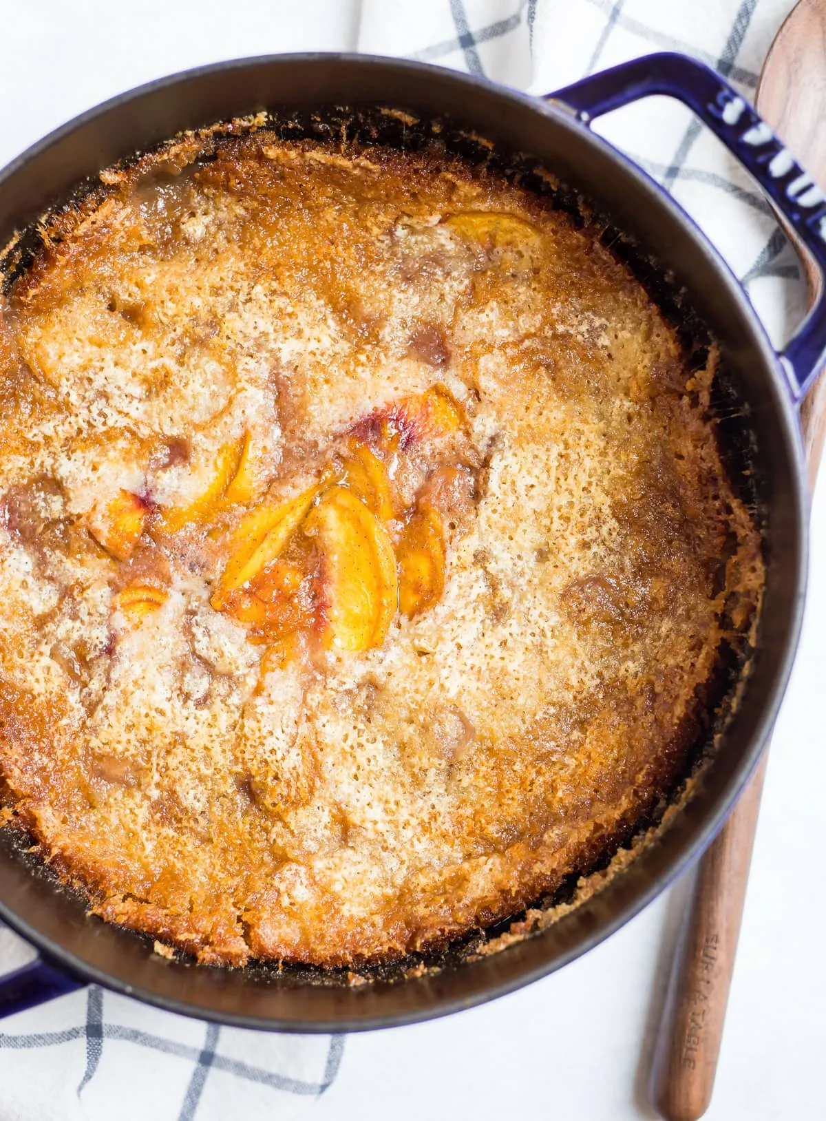 Dutch Oven Huckleberry Peach Cobbler
