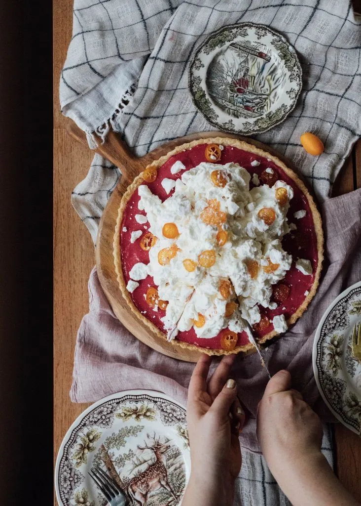 Eton Mess Topped Cranberry Curd Tart with Candied Kumquats