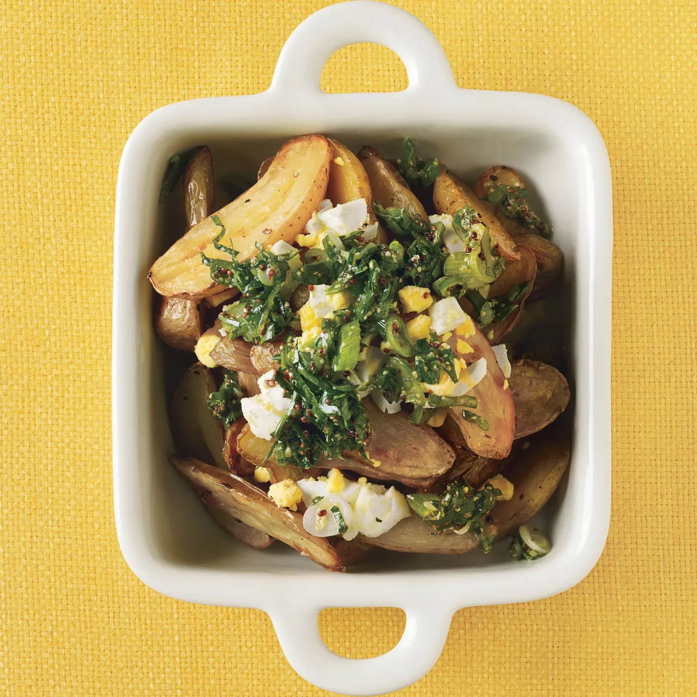 Fingerling Potato Salad with Crispy Chickpeas, Capers, and Roasted Garlic Mustard Green Pesto