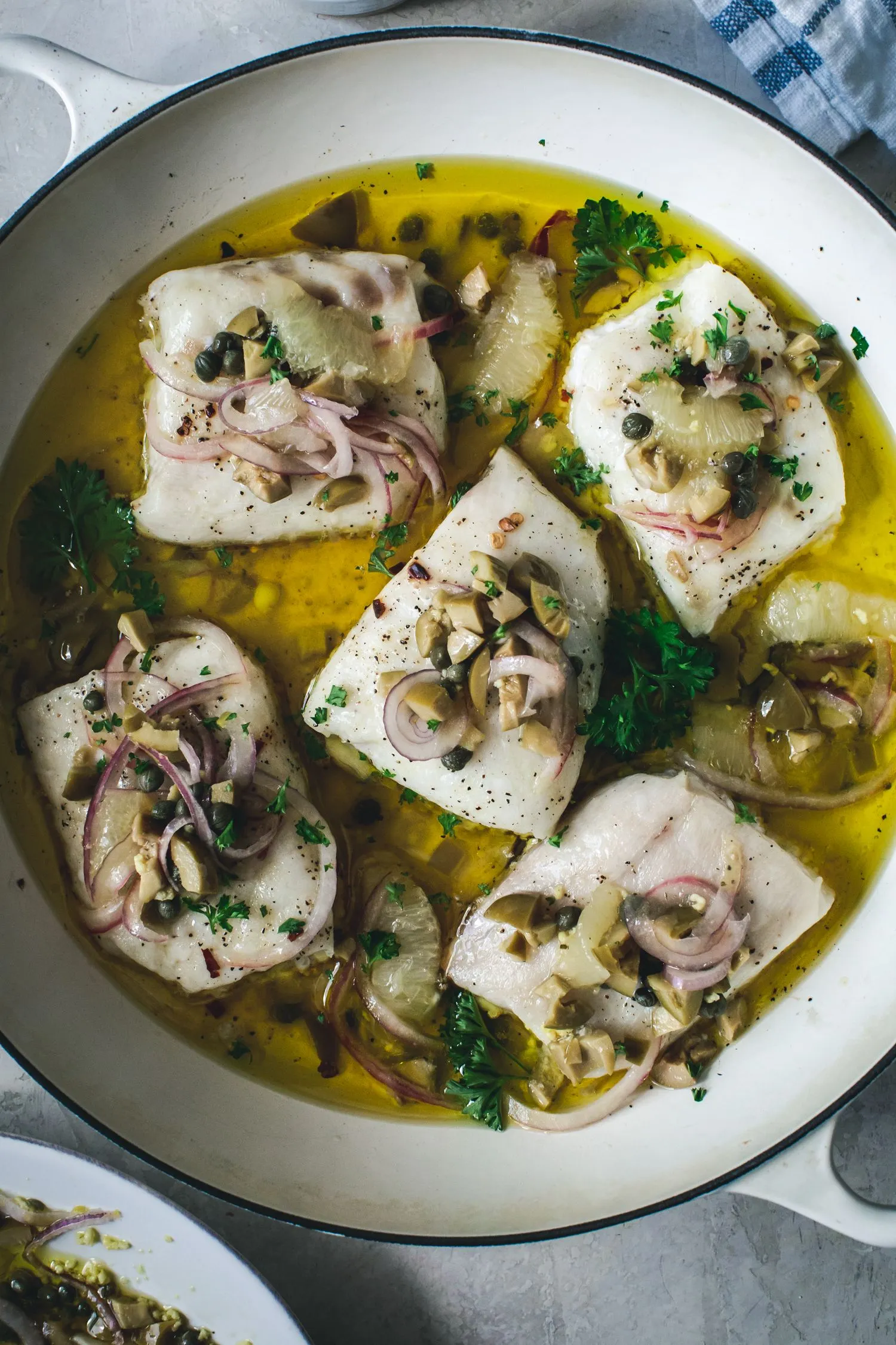 Fish Cod with Lemon, Green Olives, and Onion Relish