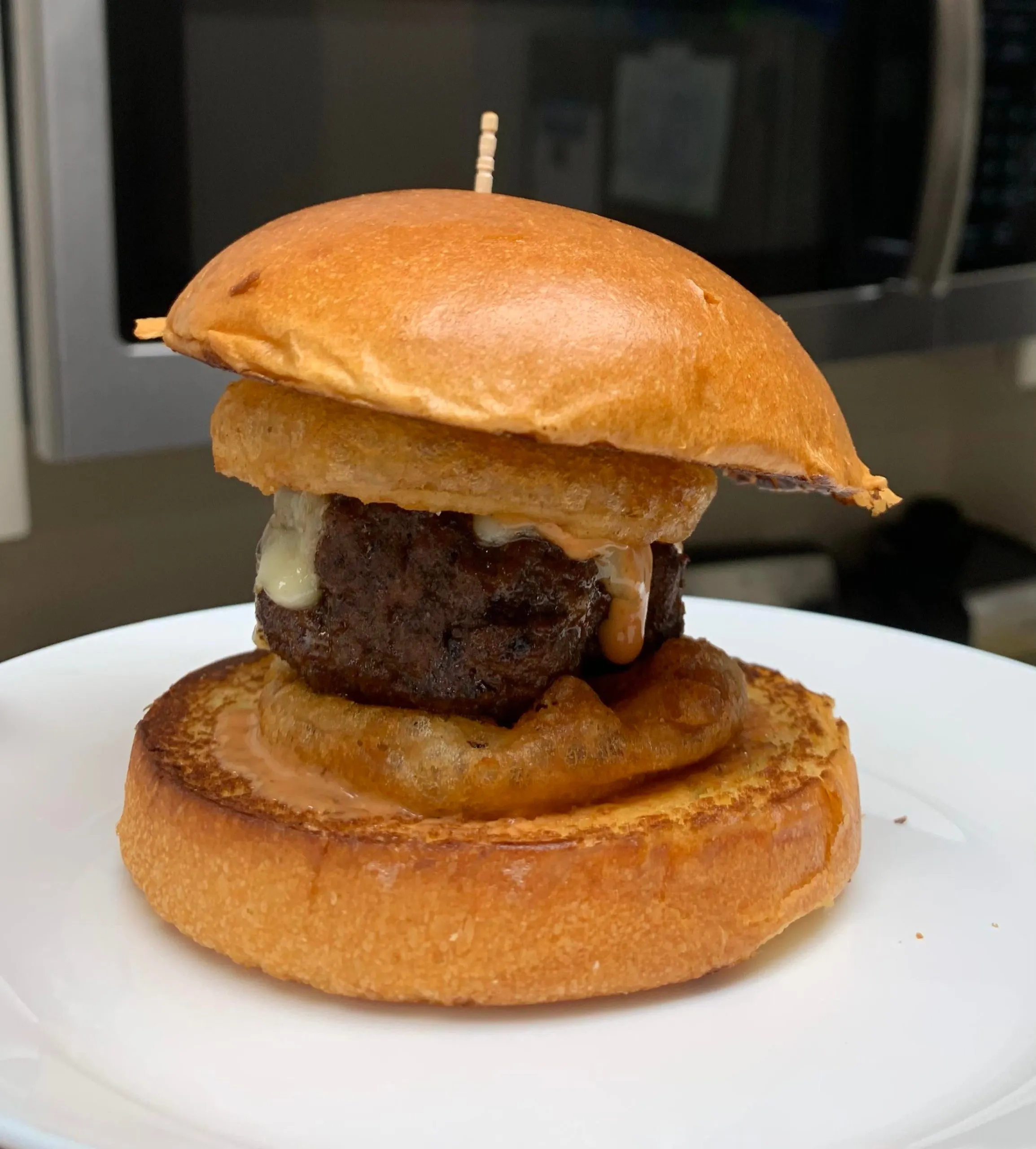 Gouda Burgers with Sauteed Onions and Baby Bellas