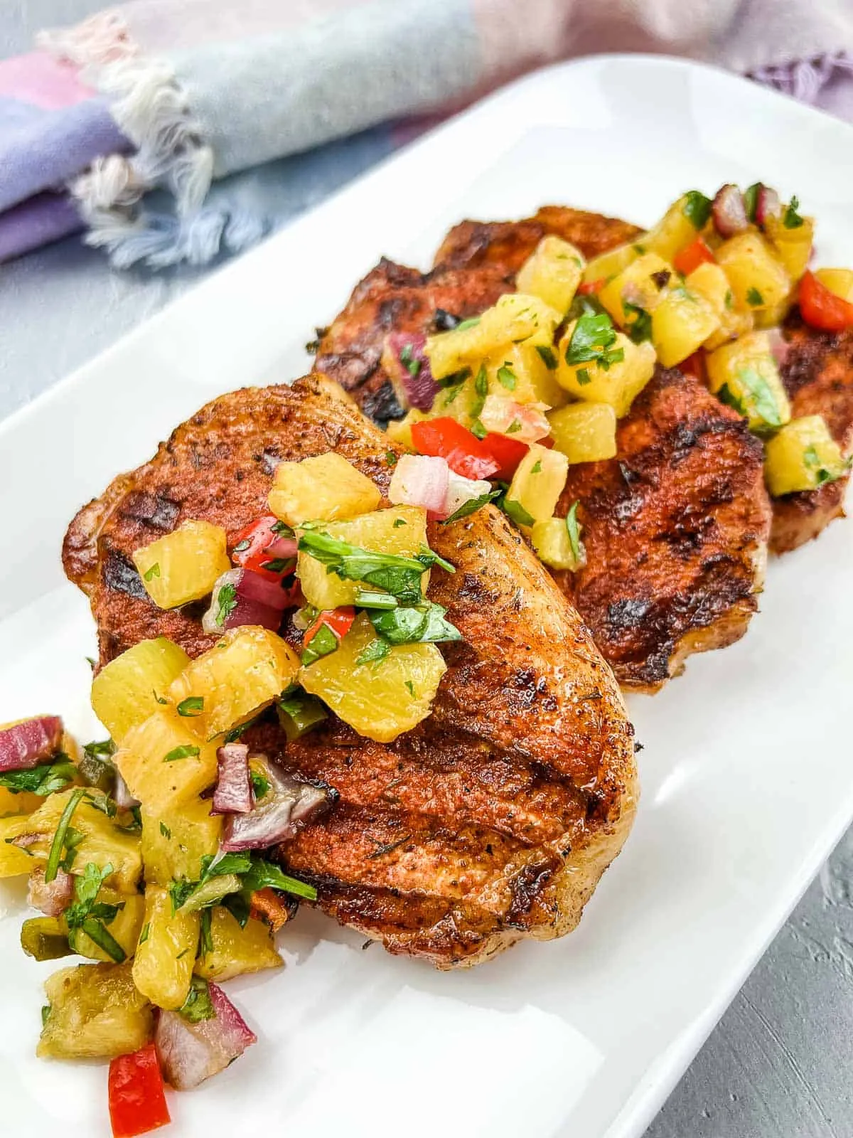 Grilled Pork Chops on a Stick with Pineapple Salsa
