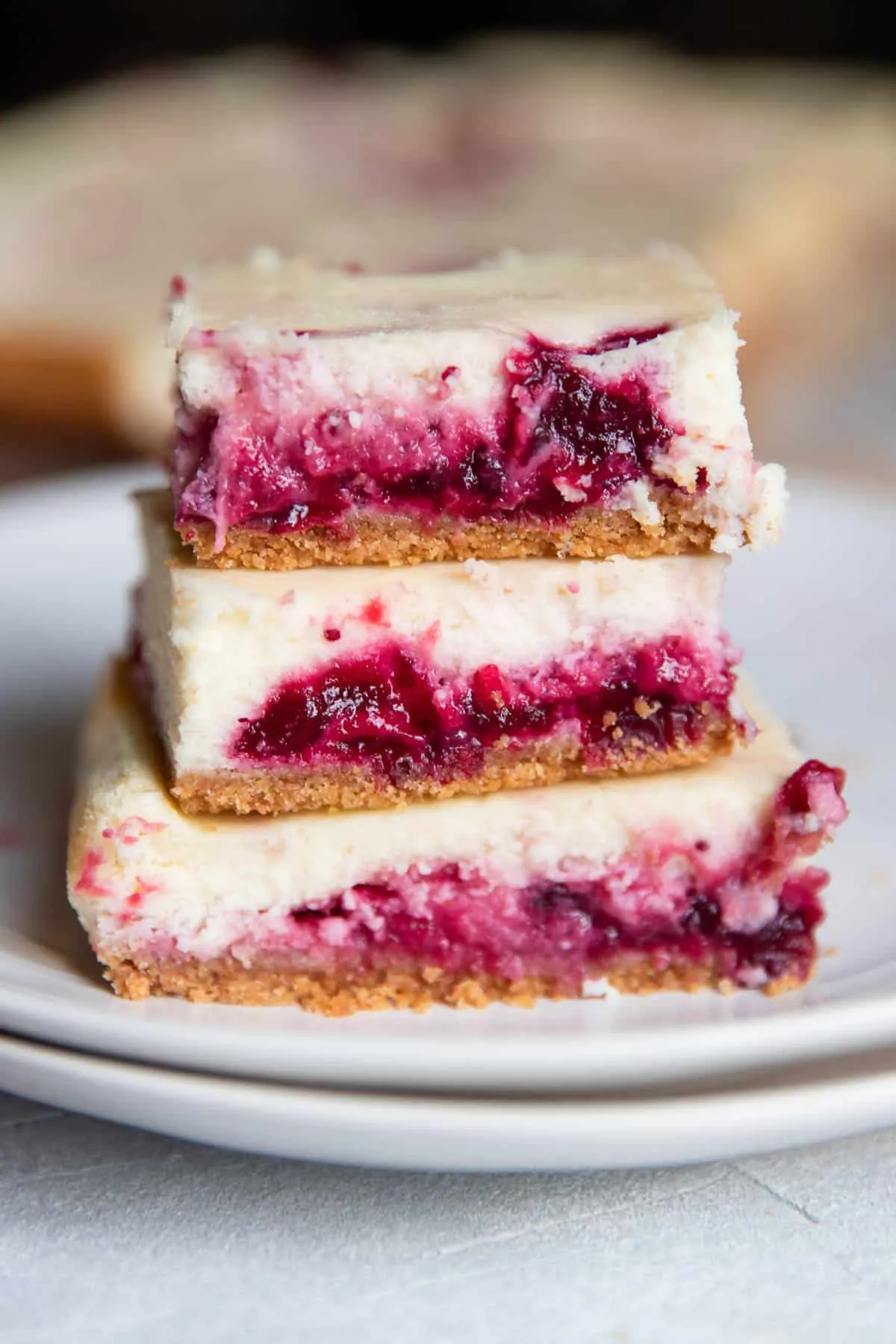 Holiday Cranberry Cheesecake Bars with Chocolate Drizzle