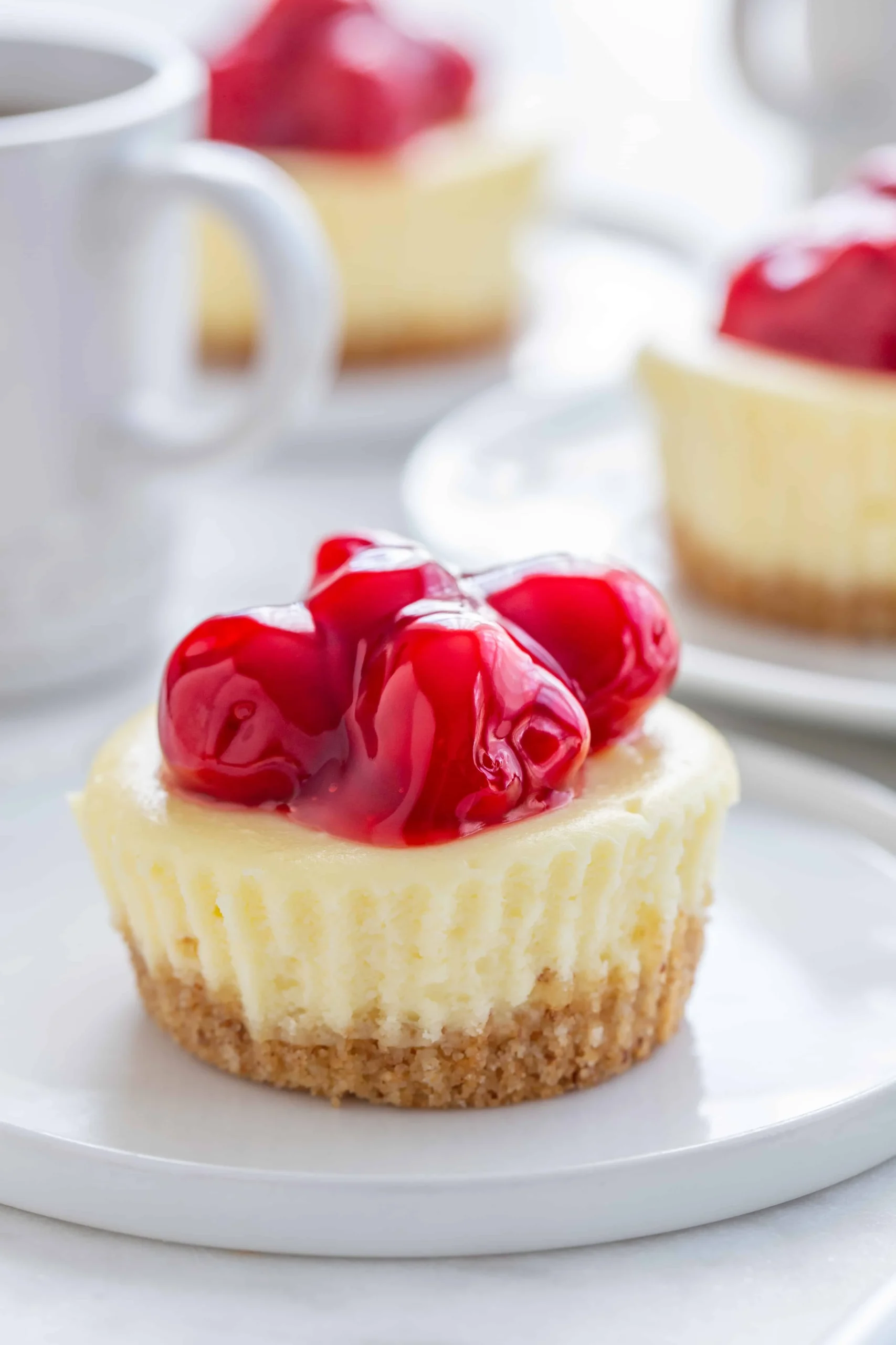 Mini Cherry Almond Cheesecakes