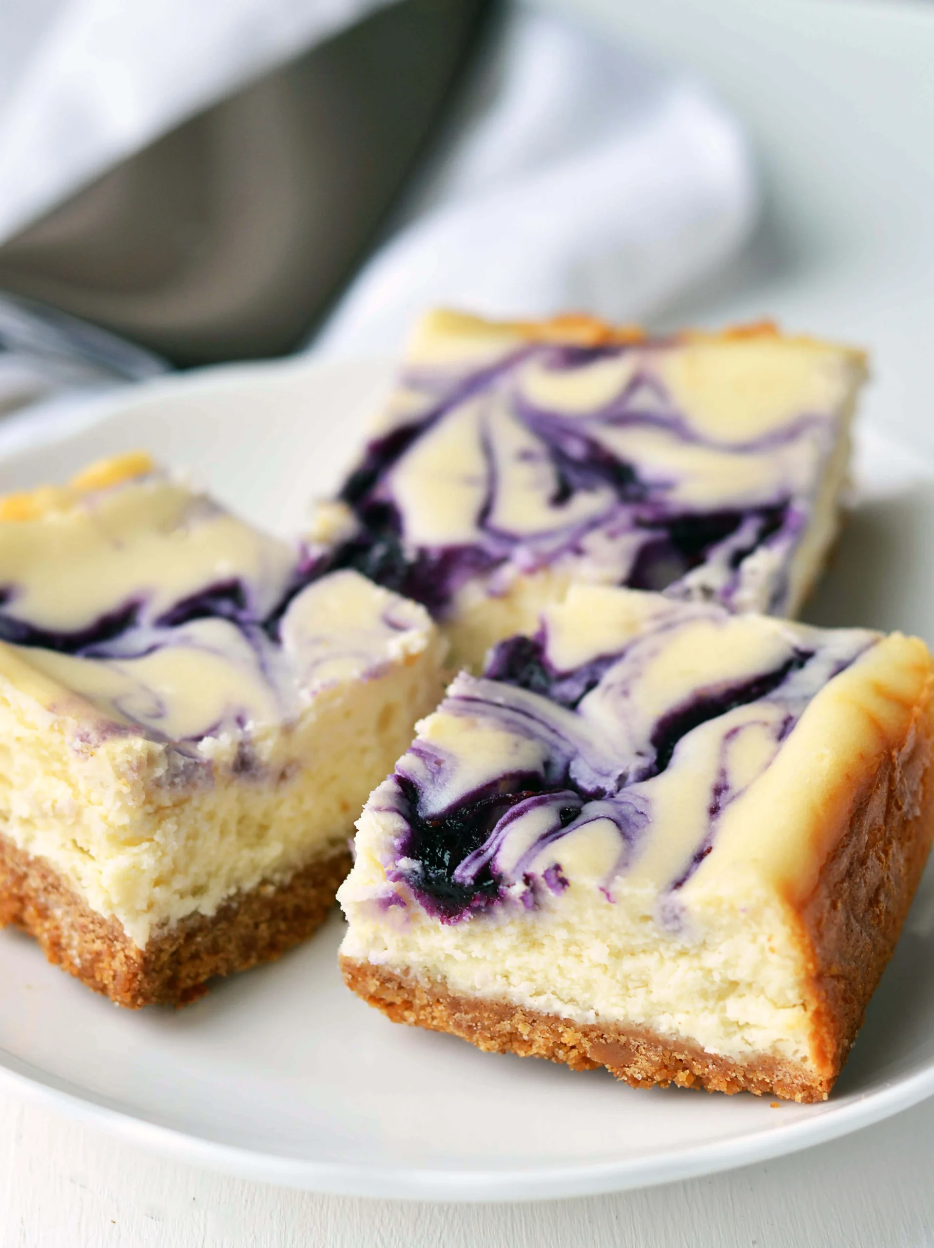 Mixed Berry Swirl Cheesecake Bars