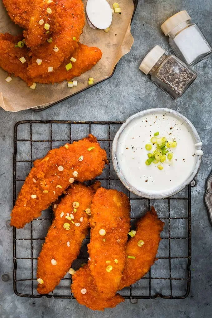 Oven Baked Buffalo Chicken Fingers with Feta Yoghurt Dip