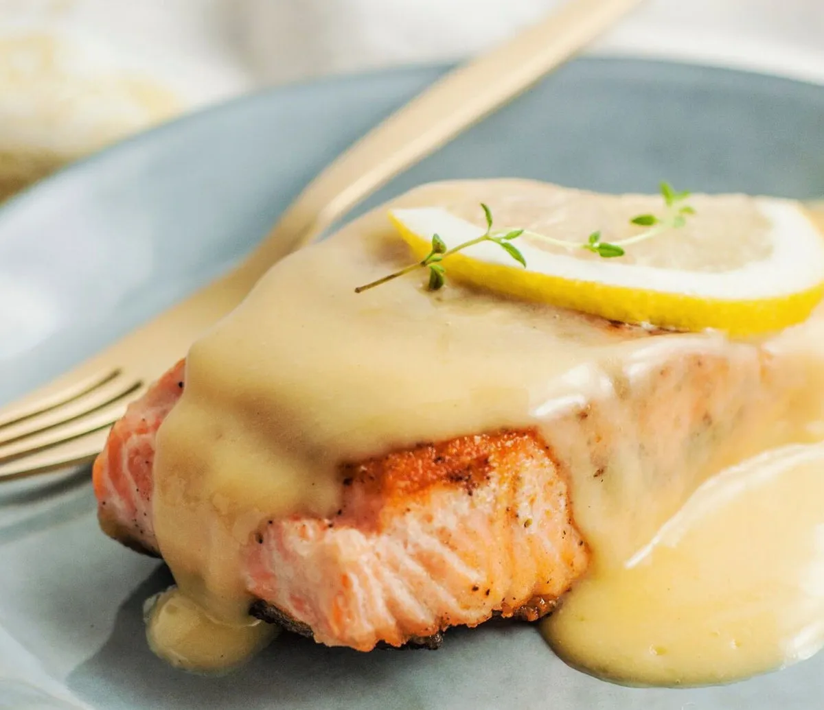 Poached Salmon in Caviar Beurre Blanc