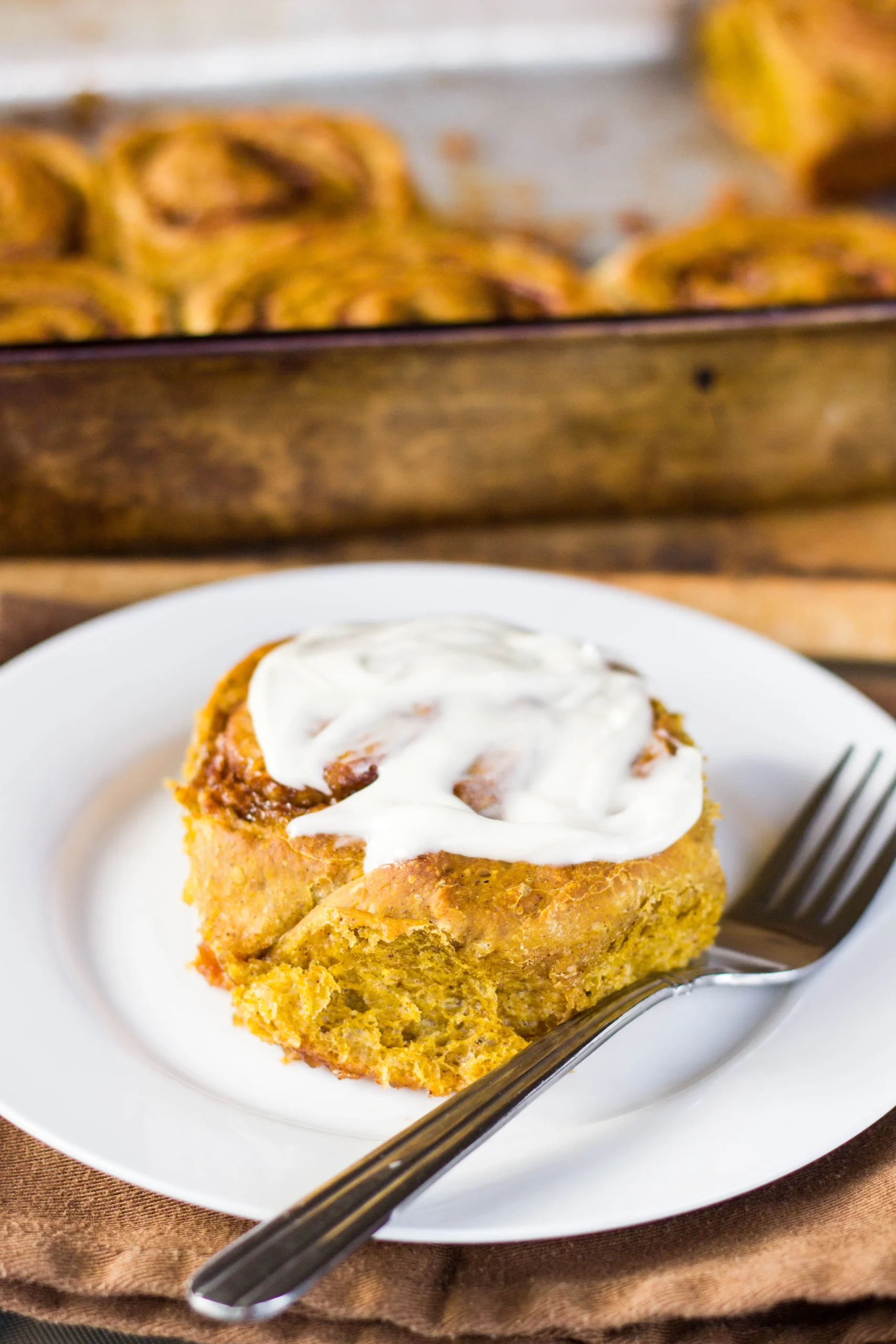 Pumpkin Cinnamon Rolls with Maple Cream Cheese Icing