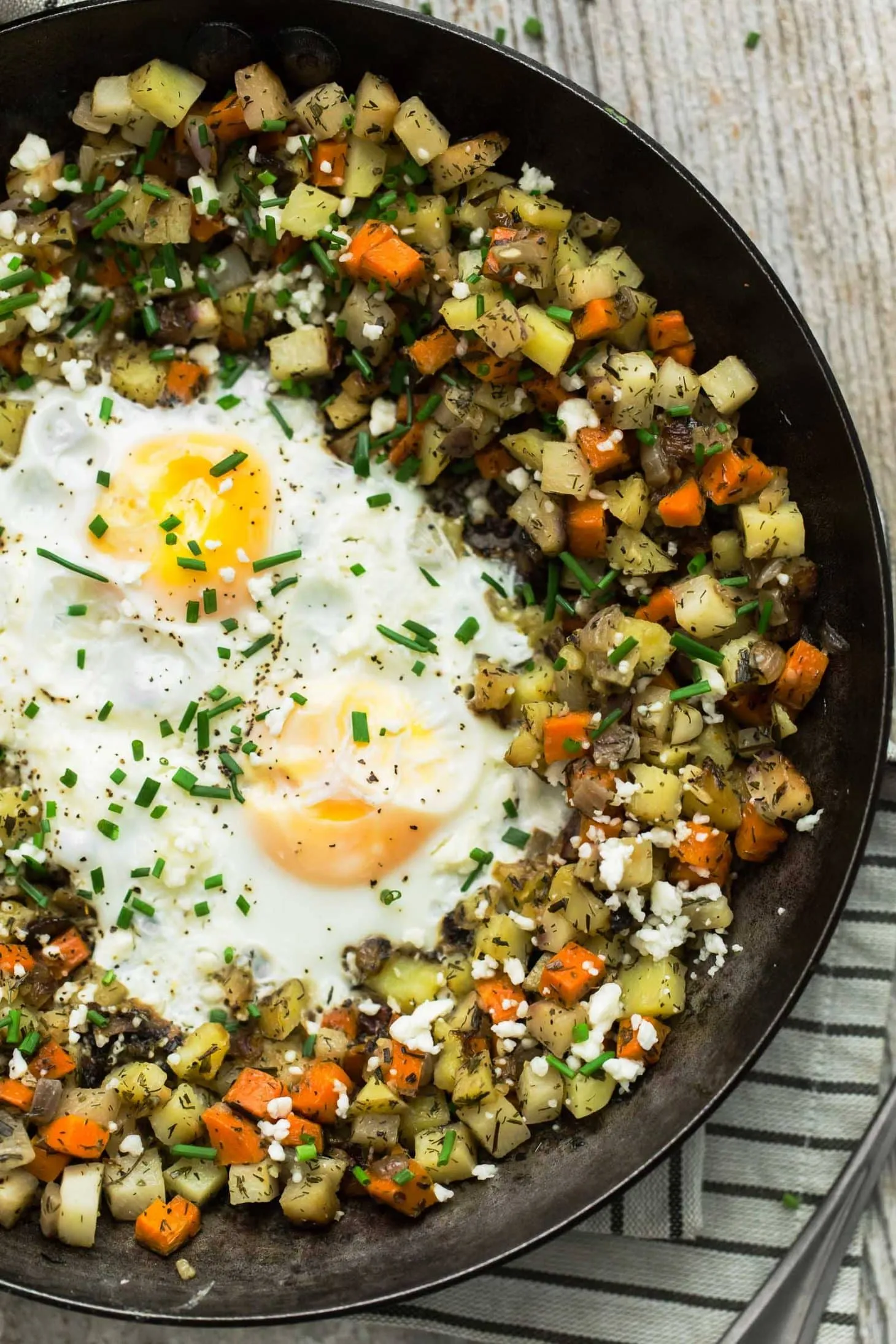 Roasted Root Vegetable Hash with Eggs, Bacon, Feta, Walnuts