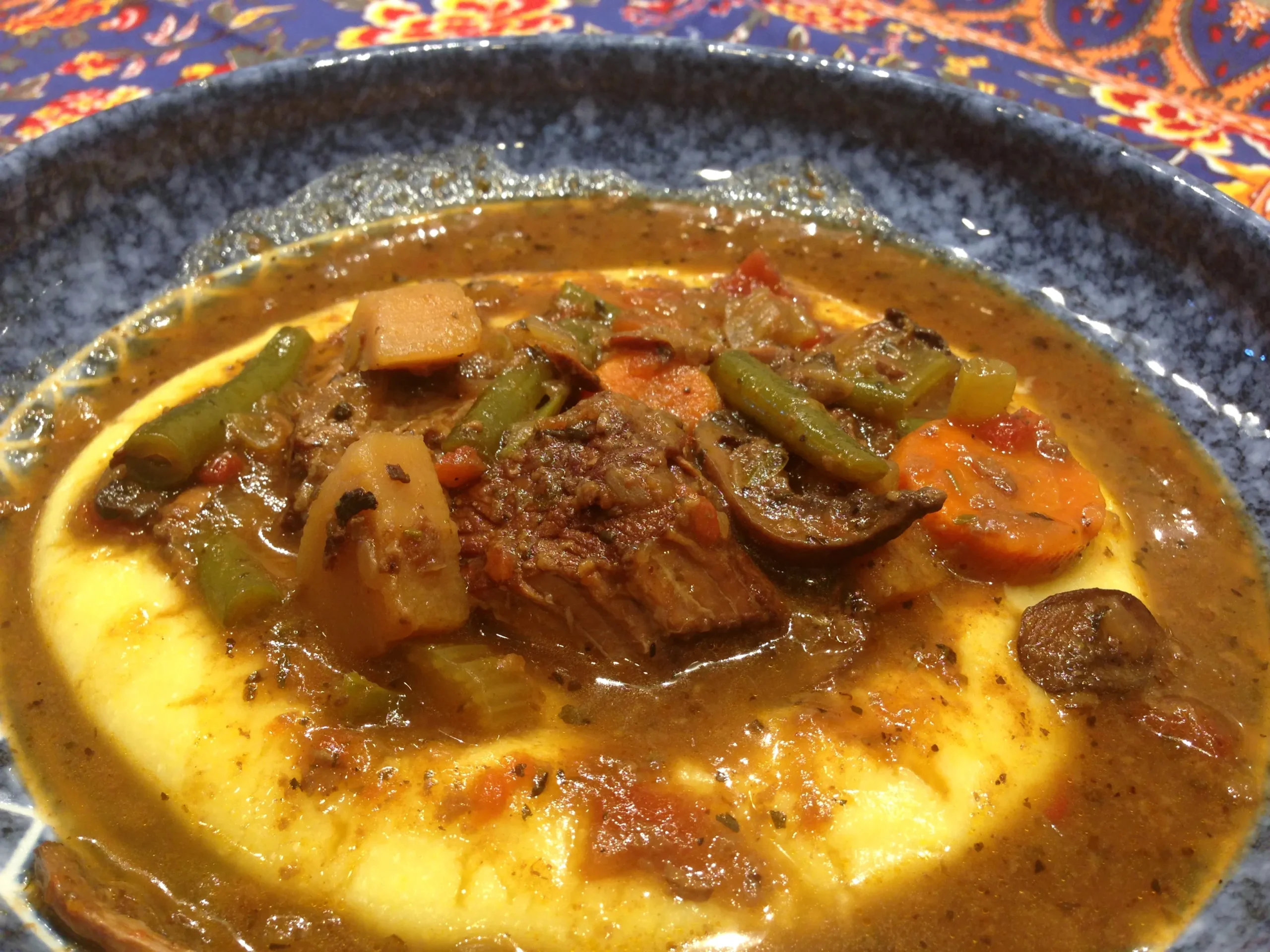 Robust Italian Stew: Wine Braised Beef over Creamy Polenta