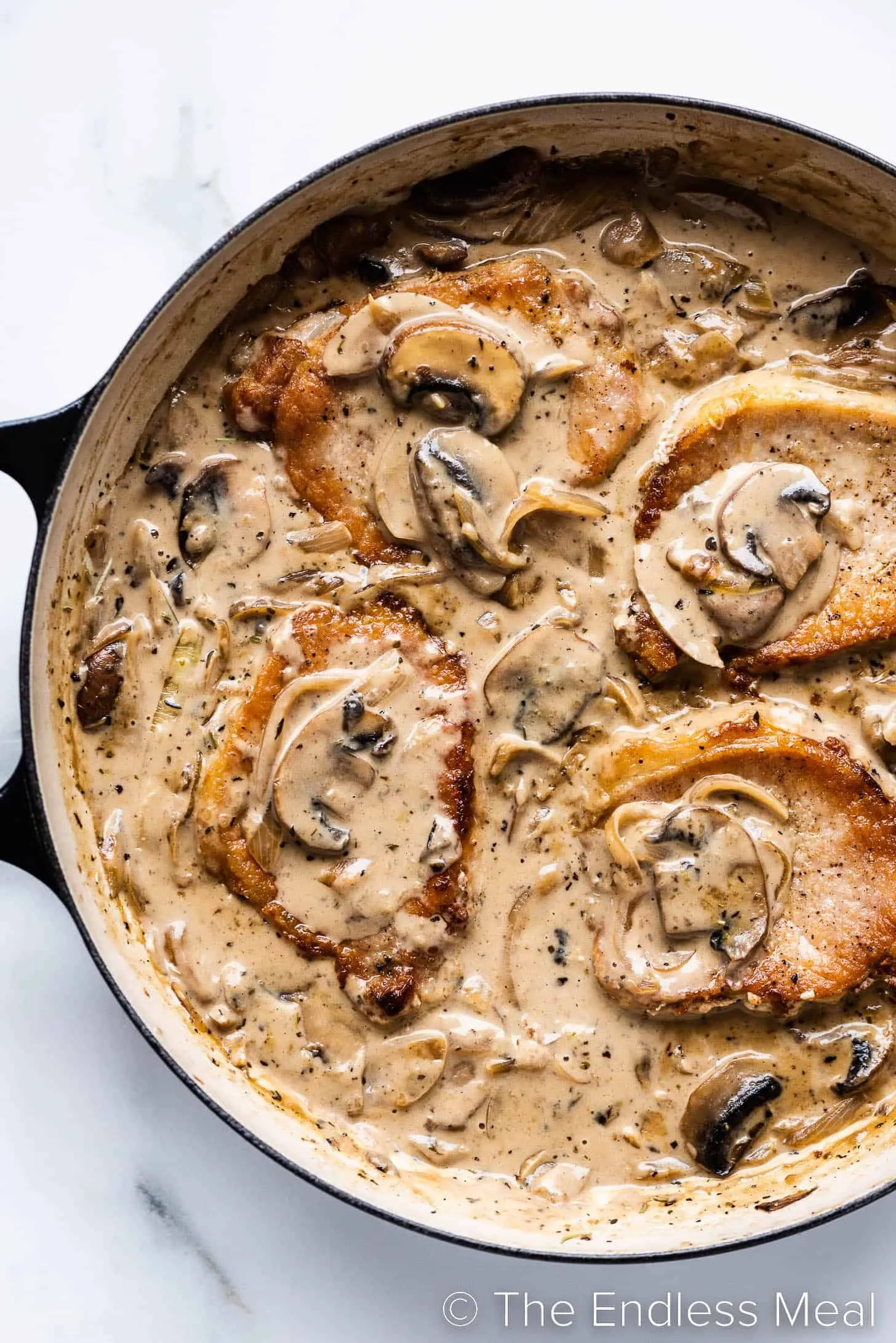 Smothered Pork Chops in a Savory Pan Sauce