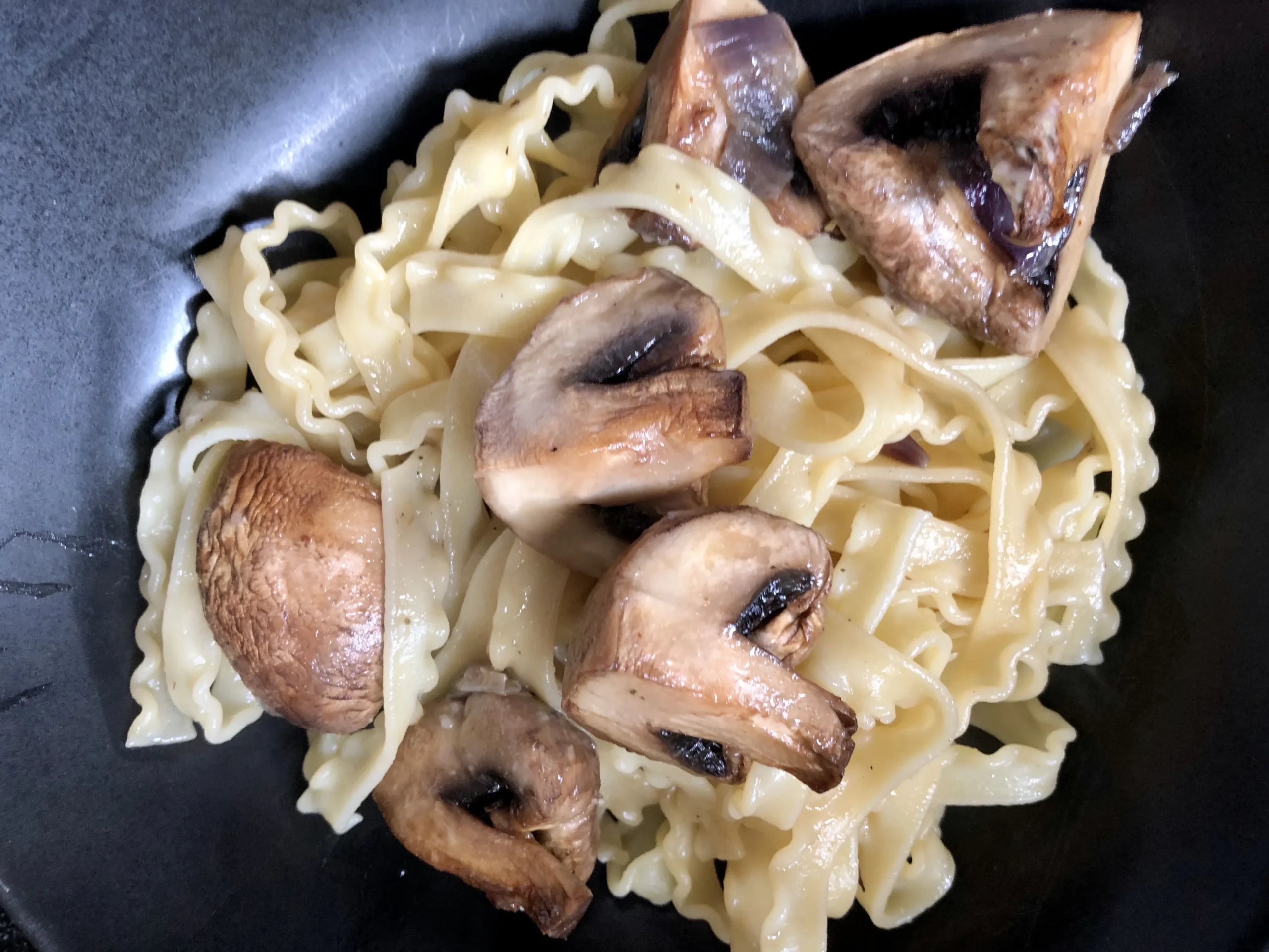 Tripolini Pasta with Wild Mushrooms and Sun Dried Tomatoes
