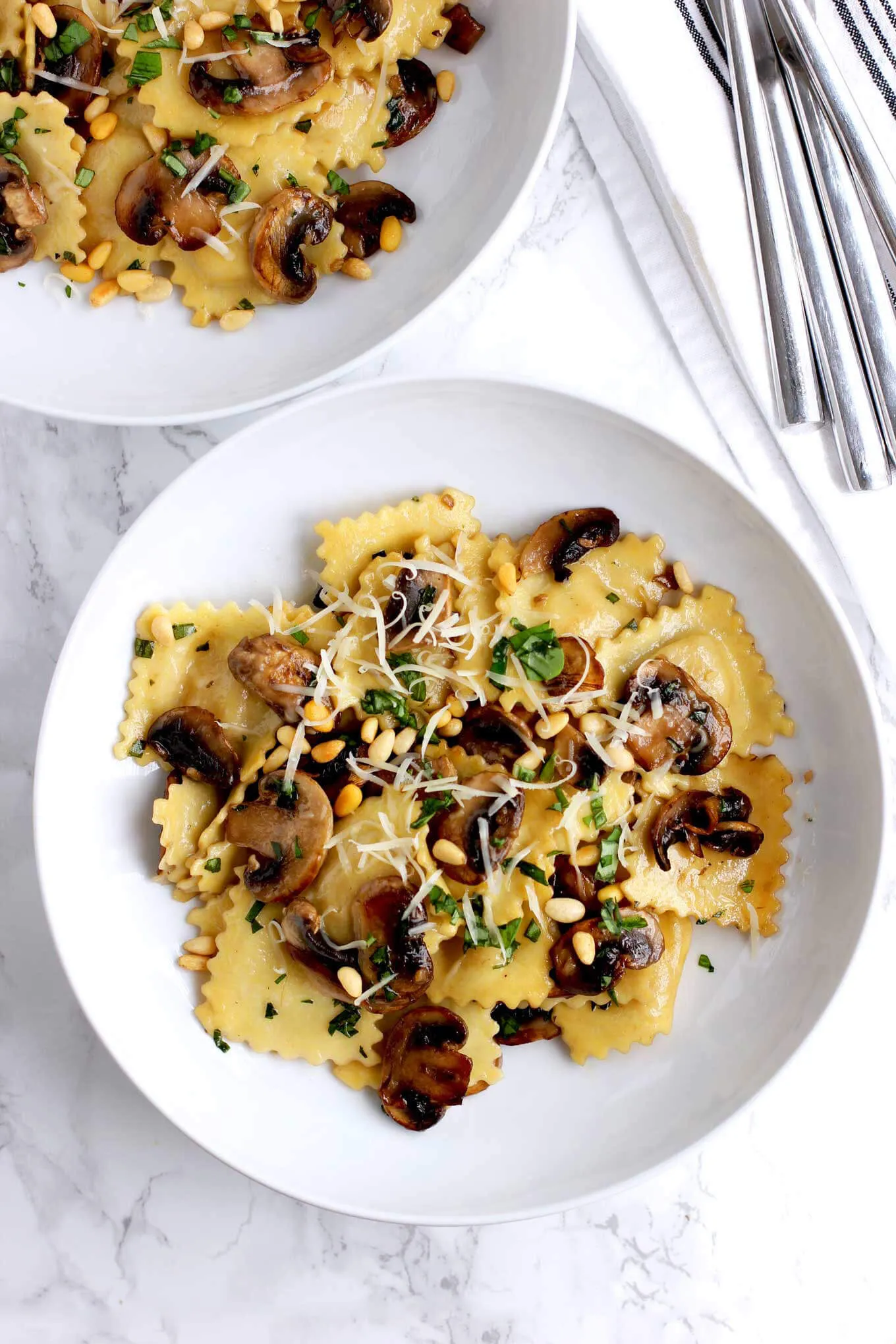 Vegetable Consomme with Mushroom Ravioli